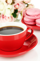 Coffee and macaroons close-up