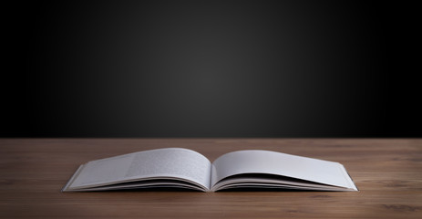 Open book on wooden deck