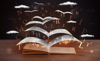 Pages and glowing letters flying out of a book