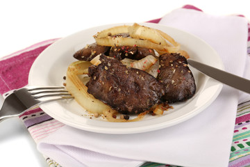 Appetizing fried chicken livers on plate isolated on white