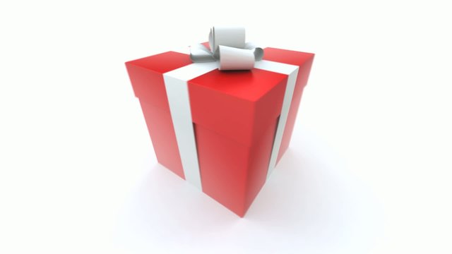 Big red gift box with a white ribbon turning around
