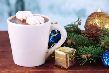 Cup of hot cacao with Christmas decorations