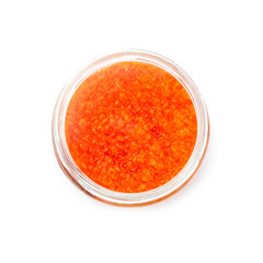 Red caviar in glass a glass jar isolated on white