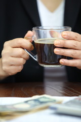 working woman with cup of coffee