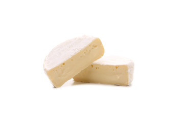 Two pieces of cheese Brie