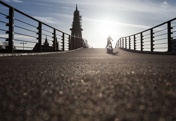 cyclist on bridge in Freiburg, Germany