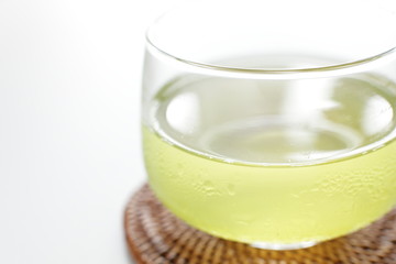 Obraz na płótnie Canvas Japanese iced green tea on white background with copy space