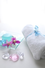 Obraz na płótnie Canvas Blue aroma soap and towel for beauty image
