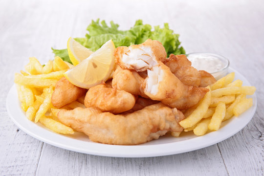 fish and chips with salad and sauce