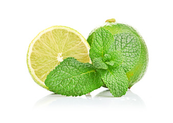 Limes and mint isolated on white background