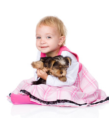 girl and puppy. looking at camera. isolated on white background