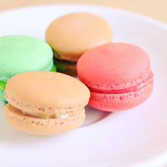 Tasty colorful macaroons with retro filter effect