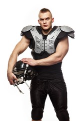Fototapeta na wymiar American football player wearing helmet and protective armour