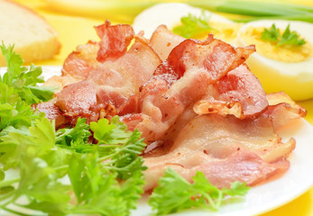 Breakfast with bacon and eggs