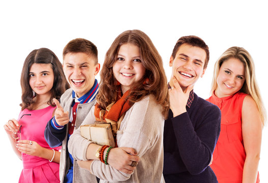 Group of cheerful teenagers on the white background