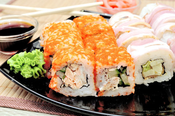 Japanese rolls with masago caviar, cheese and cucumber