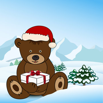 Bear in Santa Claus holding a box present