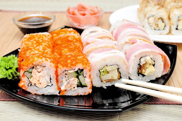 Japanese rolls with masago caviar, cheese and cucumber