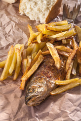 fish and chips served with bread as fast food
