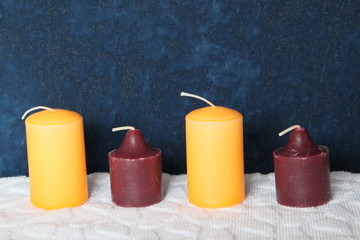 Aufgereihte Stumpenkerzen