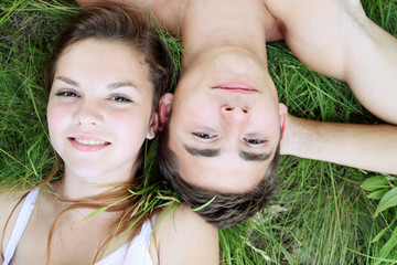 relax couple in the grass