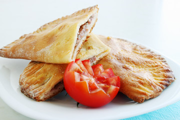 crispy cheburek with tomato