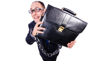 Businessman with handcuffs on white