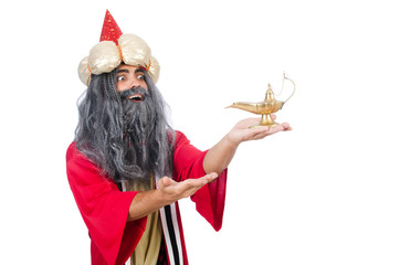 Old wizard with lamp isolated on white