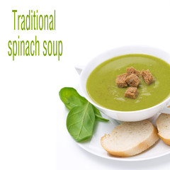 delicious spinach soup with croutons in a bowl, isolated