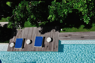 Rest area beside swimming pool at the resort.