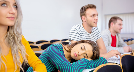 Female sleeping in the college classroom