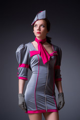 Female flight attendant in studio
