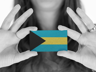 Woman showing a business card