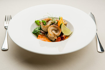 Roasted fish fillet with vegetables