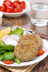 vegetarian burgers made from lentils and buckwheat, vertical