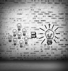 Light bulbs at brick lined wall