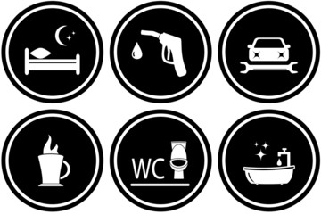 black set round road signs for hotel or gas station