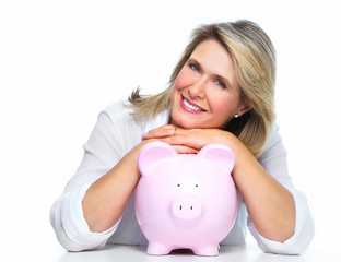 Elderly woman with piggy bank.