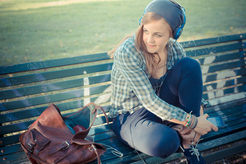 beautiful young blonde hipster stylish woman