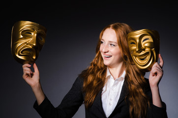 Woman with mask in hypocrisy concept