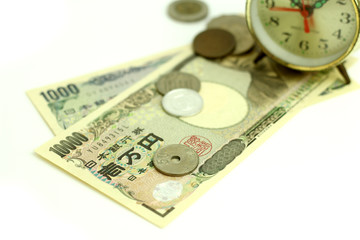 Fototapeta premium Time is money & The ancient clock and some money