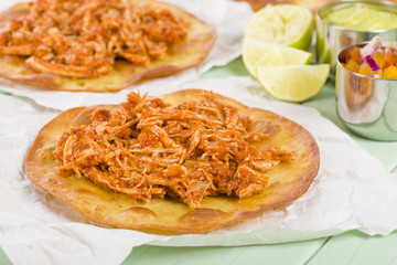 Tostadas - Mexican crispy tortilla with spicy chicken tinga