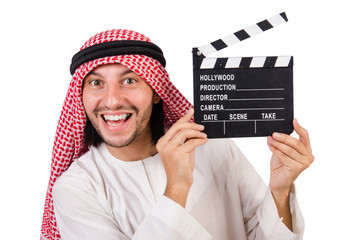 Arab man with movie clapper on white