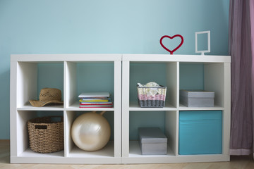 Beautiful white shelves with different home related objects