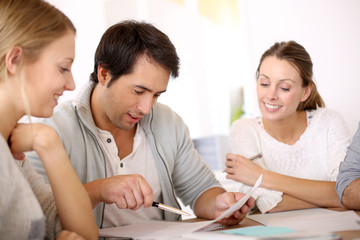 Group of business people in office working on project