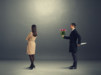 young woman and man with knife