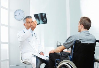 Disabled young man at doctor office