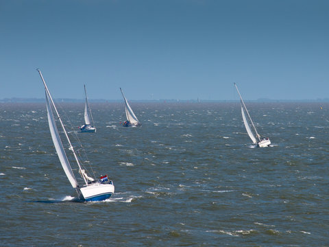 Sailing boats in strong wind