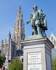 Fototapeta na wymiar Antwerp - Statue of painter P. P. Rubens and tower of cathedral
