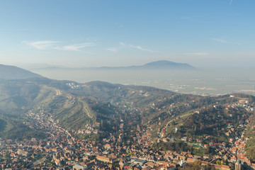 Fototapeta na wymiar Aerial View Of Brasov City In The Carpathian Mountains